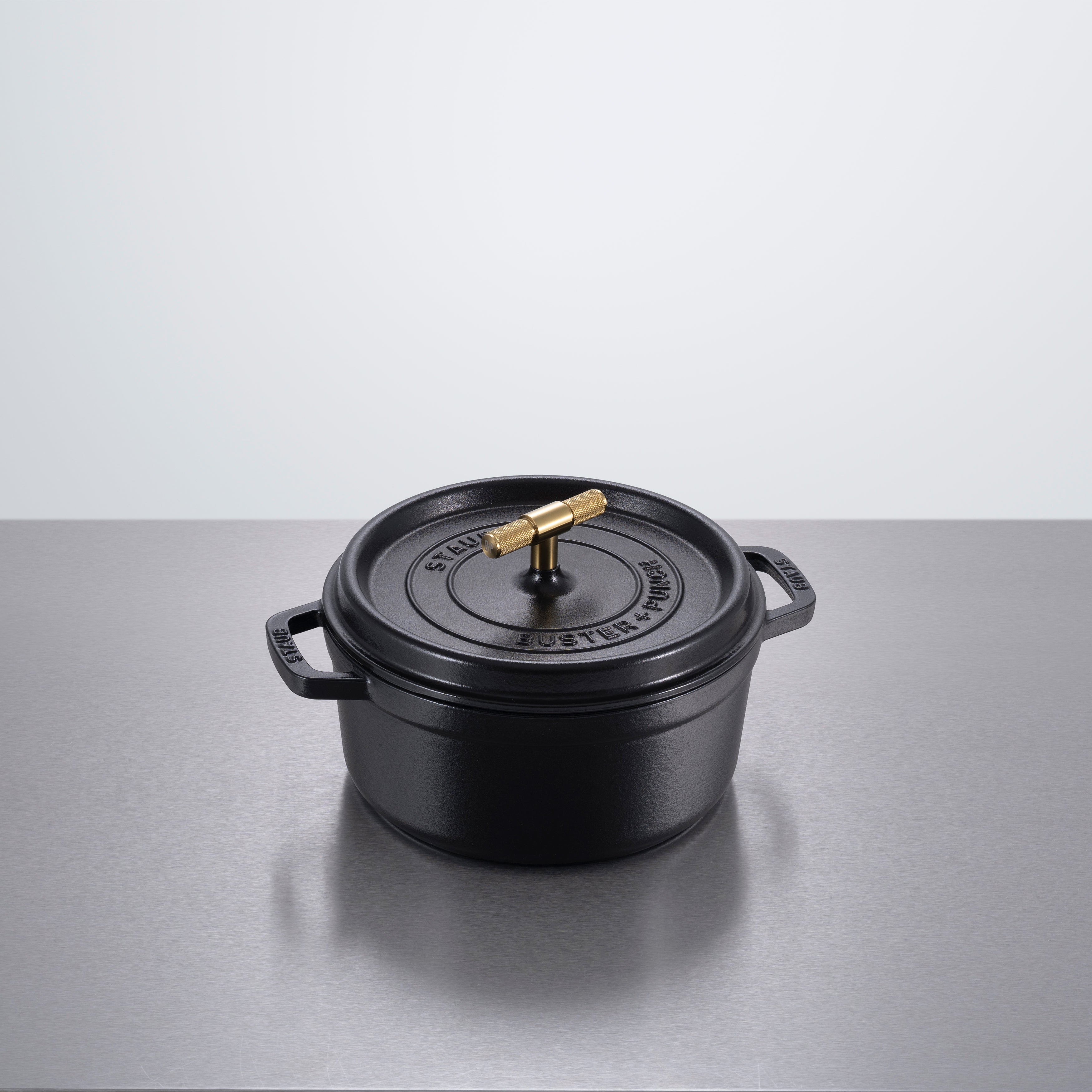 Cocotte gryde, sort/messing • Buster + Punch