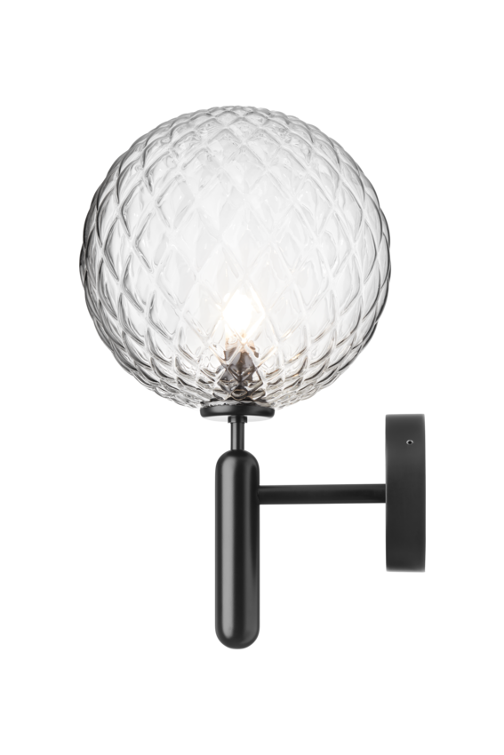 Væglampe med rund skærm af klart optikglas og sort stel, på hvid baggrund