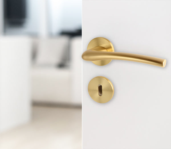 Dørhåndtag Trance i børstet messing look inkl. roset og nøgleskilt - Copenhagenhomedesign