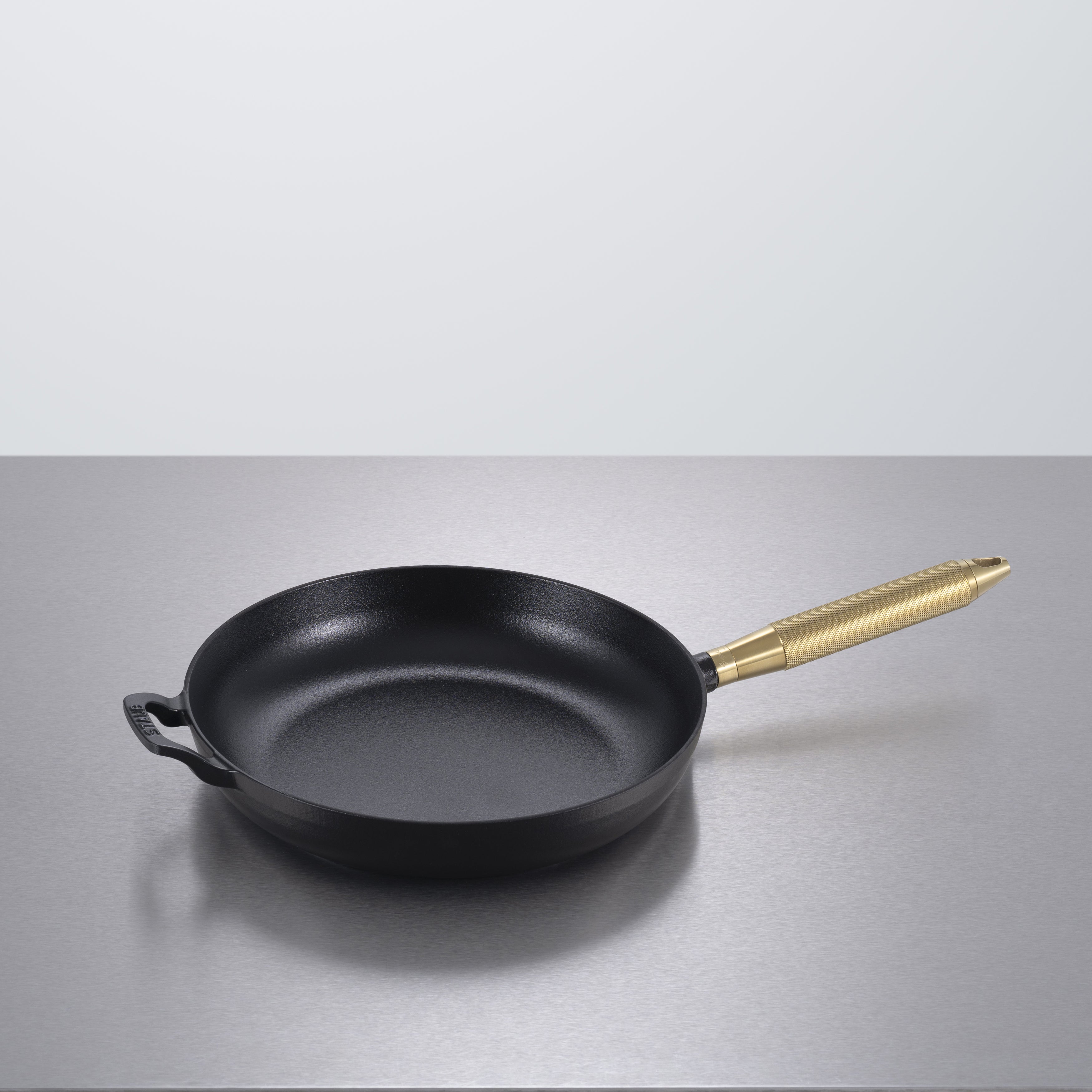 Stegepande, sort/messing • Buster + Punch