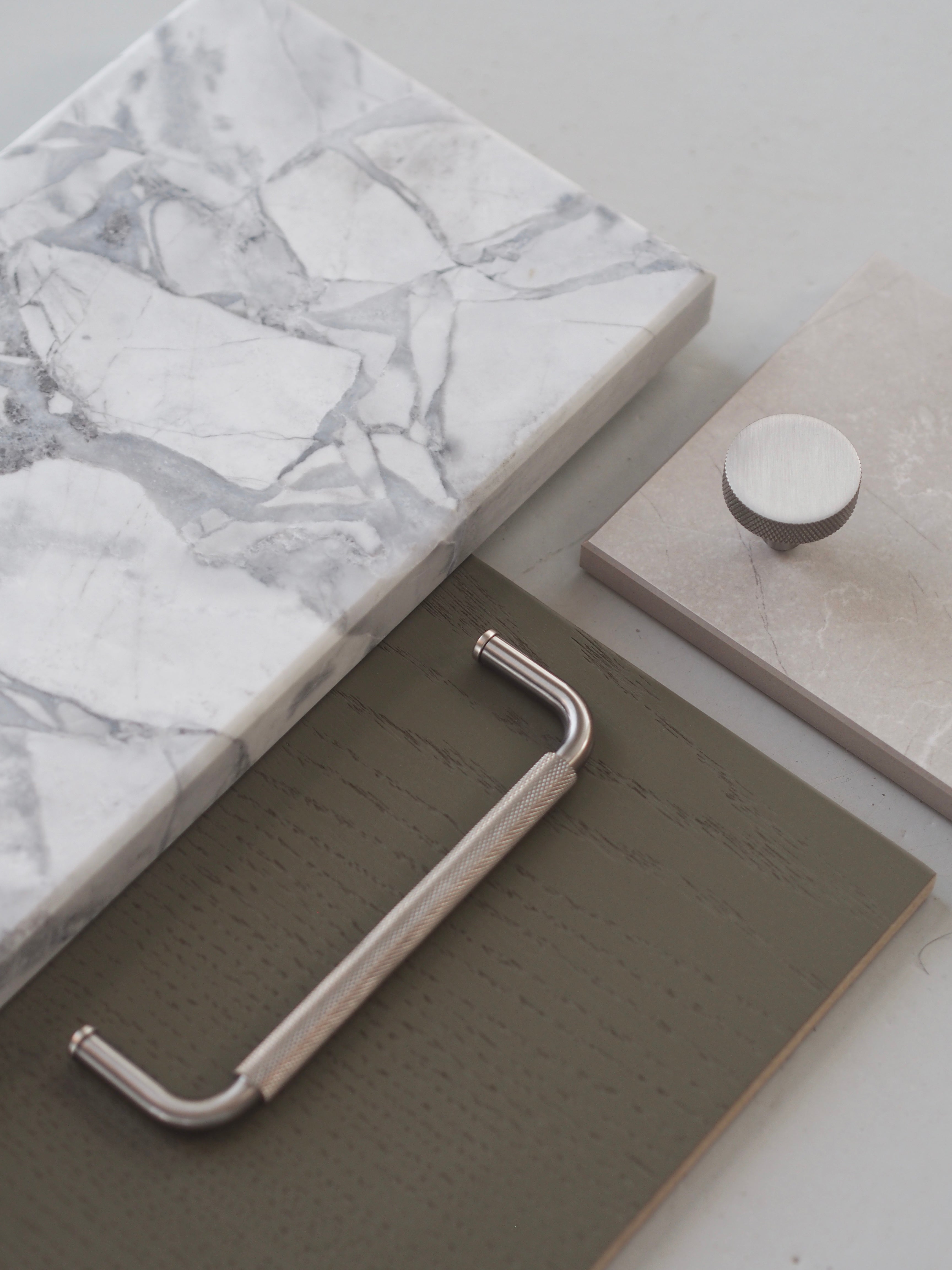 Køkkengreb med diamond cut i rustfrit stål look - Østerbro • Chr. Jørgensen