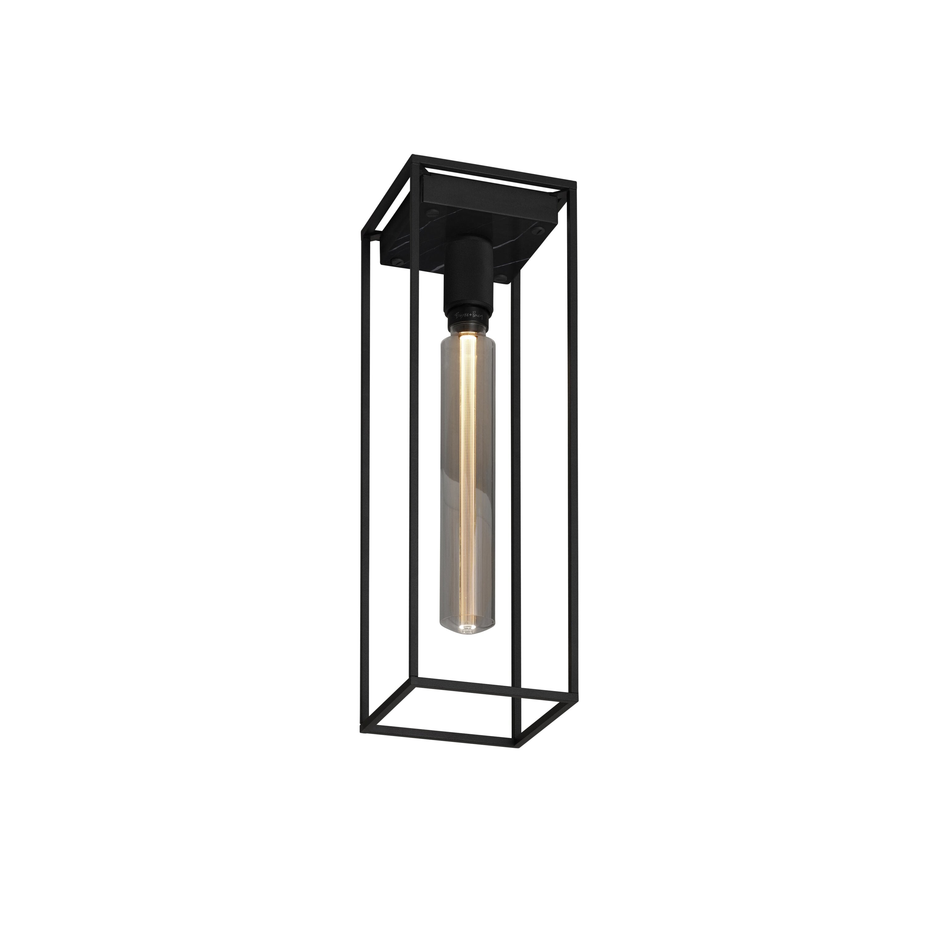 Caged loftlampe fra Buster and Punch i sort med bagpanel i sort marmor.