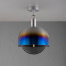 Loftlampe med fatning af stål samt skærm af brændt stål og pære af røgfarvet glas, på grå baggrund.